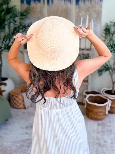 Back view of the cream Wheatfield Sun Hat's wide brim