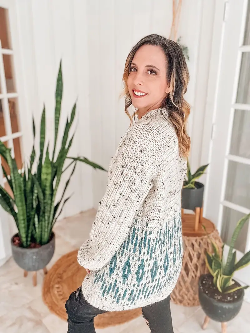 Woman in the cream Wish Upon A Star Mosaic Cardigan with a teal star band