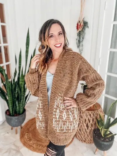 Smiling woman wearing the tan Wish Upon A Star Mosaic Cardigan
